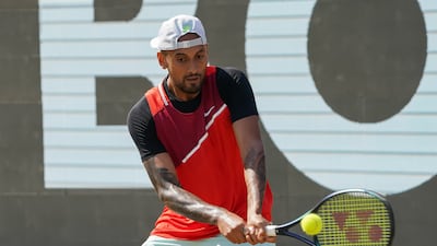 Nick Kyrgios plays a backhand. Getty