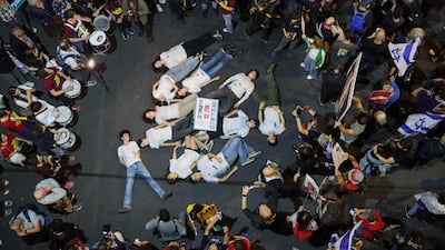 Thousands of Israelis have protested against their current government's policies in Tel Aviv amid the ongoing war between Israel and the Palestinian Hamas militant group. AFP
