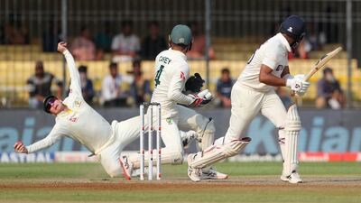 India batter Cheteshwar Pujara is caught in the slips by Australia's Steve Smith. AP