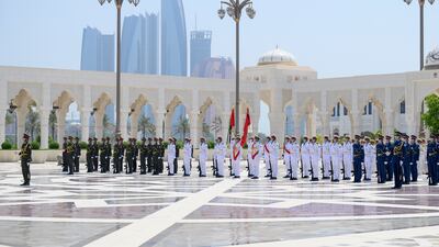 Members of the UAE Armed Forces form a guard of honour.