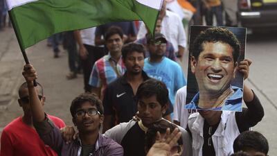 Millions of cricket fans, including those above, bid an emotional adieu to Sachin Tendulkar following in his 200th and final Test on Saturday. Some of them may now expect the legend to be more candid about his views on issues, according to our columnist. Rafiq Maqbool & Rajanish Kakade / AP Photo