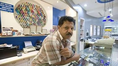 Abdul Muthalib says the number of keys cut this month at the shop he manages has dropped from 1,500 to 20.