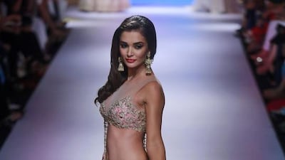 Bollywood actress Amy Jackson with a Anushree Reddy design during the Lakmé Fashion Week in Mumbai. Rafiq Maqbool / AP Photo