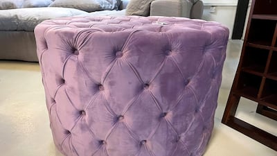 An upcycled cushion by Ruby Home Furnishings, Dh550, at La Brocante.