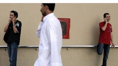 Etisalat and du customers will soon be able to change operators while keeping their mobile number. Ryan Carter / The National