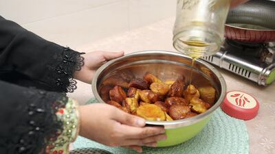 Family members gathered on Sunday to set out the iftar table and cook traditional Emirati meals for guests who travelled from Dubai.