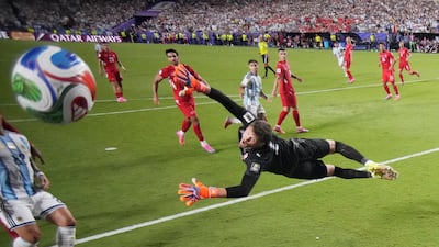 Argentina's Julian Alvarez curls in his team's second goal during their extra-time World Cup victory over Switzerland. Reuters