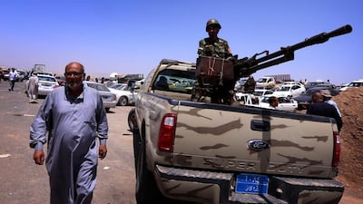 Iraqi police, military and security officials said the insurgents, armed with anti-aircraft weapons and rocket-propelled grenades, had taken over almost all police and army checkpoints in and around Mosul early on Tuesday. Safin Hamed/AFP Photo