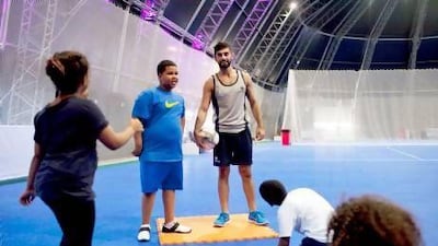 Emirati Hamdan Khouri, a personal trainer at Haddins Fitness, wants to promote a healthy lifestyle to children in the UAE. Christopher Pike / The National