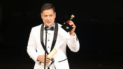 Filipino director Brillante Mendoza receives the Best Artistic Contribution award during the closing ceremony of the 41st Cairo International Film Festival. Reuters