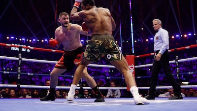 Kristian Prenga on the attack against Anthony Joshua during their heavyweight fight. Rueters