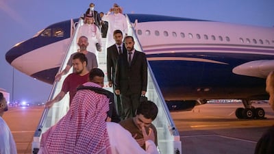 Ten prisoners of war released by Russia arrive at King Khalid International Airport, in Riyadh, Saudi Arabia. Reuters