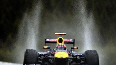 Mark Webber splashed his way to the top of the speed charts Friday during practice for Sunday's Belgian Grand Prix.