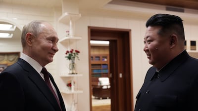 Mr Putin and Mr Kim arrive for their talks. EPA / Sputnik / Kremlin pool