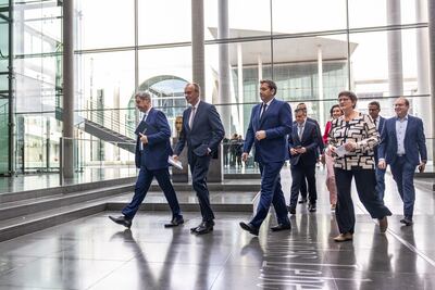 The party leaders arrive to present the coalition contract between the three parties. Getty Images