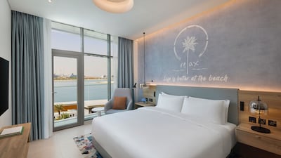 Hotel rooms have simple, clean interiors and many offer sea-facing views