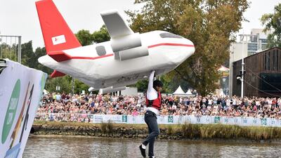 Campbell Bott flys the High Flyer into the Yarra River during the Birdman Rally. Julian Smith / EPA
