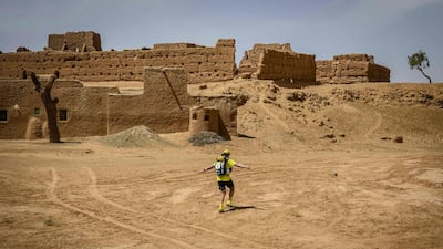 A man competes in the stage 3 of the 34rd edition of the Marathon des Sables, between Kourci Dial Zaid and Jebel El Mraïer in the southern Moroccan Sahara desert. AFP