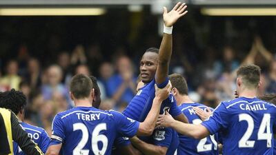 Chelsea's Didier Drogba, centre, is carried off the pitch by his teammates after being substituted against Sunderland during a Premier League soccer match at Stamford Bridge in London, Britain, 24 May 2015. EPA/ANDY RAIN