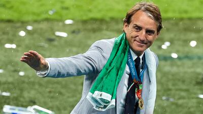 Italy coach Roberto Mancini waves after winning the UEFA Euro 2020 Final at Wembley Stadium, London. Picture date: Sunday July 11, 2021.