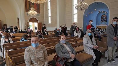 Worshippers attend a Christmas mass for the Armenian Orthodox in the Lebanese town of Antelias, north of Beirut. AFP