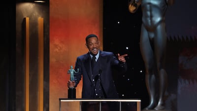 Will Smith receives the award for Outstanding Performance by a Male Actor in a Leading Role for 'King Richard'. Reuters