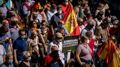 Demonstrators take part in a protest against the increasing price of electricity in Madrid. AP