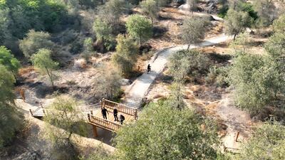 Services in the park include public restrooms, safety instructions, and signage boards.