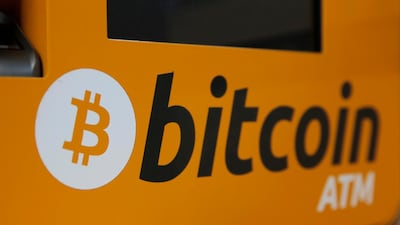 Bitcoin logo on an ATM in Hong Kong. Google has banned advertisements for cryptocurrencies such as Bitcoin, as well as related content like trading advice and cryptocurrency wallets. Kin Cheung/AP