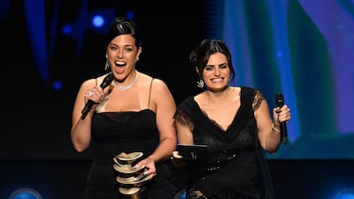 Model Ashley Graham and actress Nava Mau present the Model of the Year award