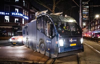 A water cannon truck is seen near Beijerlandselaan shopping district of South Rotterdam in The Hague, Netherlands. EPA/ANP