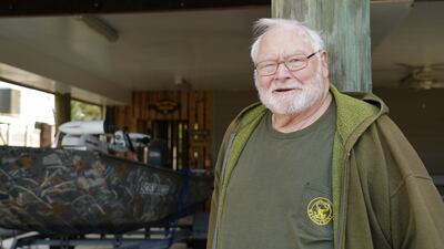 Sumter Moore, 82, in front of his home on Pawleys Island. Mr Moore's family has had property on the island since 1943. Willy Lowry / The National
