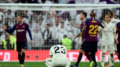Real Madrid's Spanish defender Sergio Reguilon bends down at the final whistle. AFP