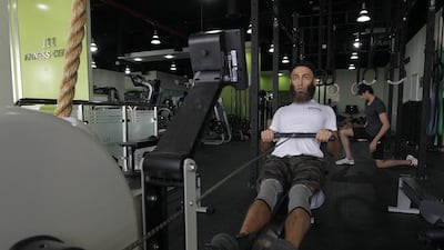 Faris Al Hammadi co-wrote a paper on the as-yet nascent CrossFit culture in the UAE, which found that the sport intimidates many because of its perceived cliquey aspect and high cost. Jeffrey E Biteng / The National