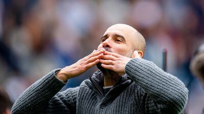 Manchester City manager Pep Guardiola celebrates after the Premier League win against Burnley. EPA
