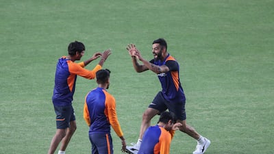 India captain Virat Kohli, right with teammates. AP
