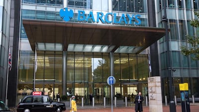 A London taxi cab sits in front of the Barclays headquarters in the Canary Wharf business, financial and shopping district of London. Simon Dawson / Bloomberg