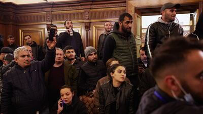 Protestors storm Armenian Prime Minister Nikol Pashinian's office after the announcement of a peace deal in the war between Armenia and Azerbaijan in Yerevan. Getty Images