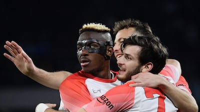 Napoli's Nigerian forward Victor Osimhen celebrates with Khvicha Kvaratskhelia (r) after scoring against Cremonese on February 12, 2023 at the Diego-Maradona stadium in Naples. AFP
