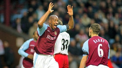 23) Dion Dublin - 111 goals in 312 games. Ratio: 0.36. (Manchester United two goals, Coventry City 61, Aston Villa 48). Action Images