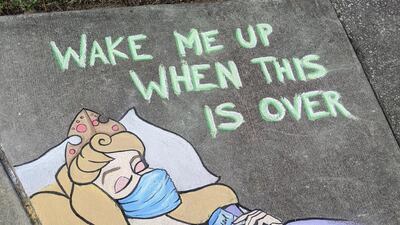 Princess Aurora from the film 'Sleeping Beauty', based on a fairy tale by Charles Perrault, dons a face mask while she slumbers. Casey Drake