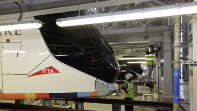Workers in the maintenance building for the Dubai Tram. Jeffrey E Biteng / The National