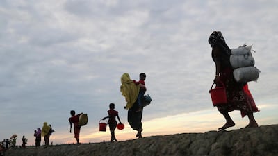 Rohingya refugees pictured after crossing the Naf River into Bangladesh. Mohammad Ponir Hossain / Reuters