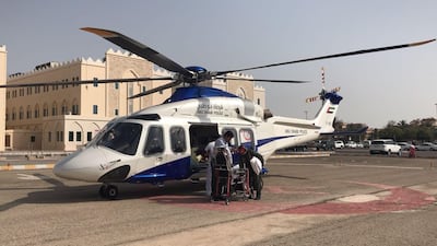 A girl, 10, is delivered to Sheikh Khalifa Medical City after suffering from severe abdominal pain at her home on Dalma Island. Courtesy Abu Dhabi Police
