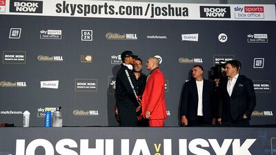 Anthony Joshua and Oleksandr Usyk face off. PA