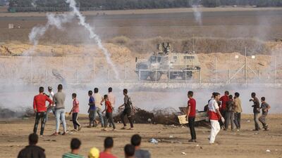 Israeli security forces fire teargas following clashes with Palestinian protesters during a demonstration along the border with Israel east of Khan Yunis in the southern Gaza strip. AFP