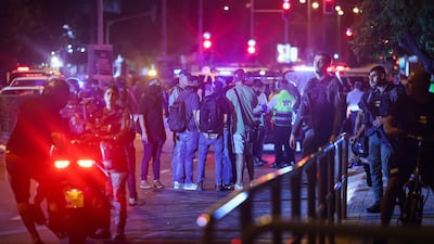 Israeli security and emergency personnel at the site of an explosion in Tel Aviv on August 18, 2024. AFP