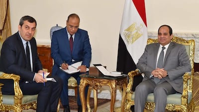 Egypt's president Abdel Fattah El Sisi, right, has warned the West against getting embroiled in Libya's civil war, saying that the international community should instead look to strengthening the army of Libya’s internationally recognised government and let them do the job of stabilising the country. The Egyptian Presidency/Handout via Reuters