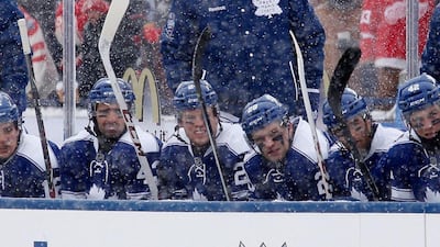 Coach Randy Carlyle of the Toronto Maple Leafs watches the action against the Detroit Red Wings in the first period of the NHL Winter Classic at Michigan Stadium on Wednesday in Ann Arbor, Michigan. Gregory Shamus/Getty Images