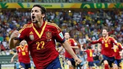 Spain's Jesus Navas celebrates after scoring his side winning penalty.